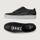 High-Traction Rubber Outsole & Lug Tread Pattern on Carter Runn Black Leather Sneakers For Men