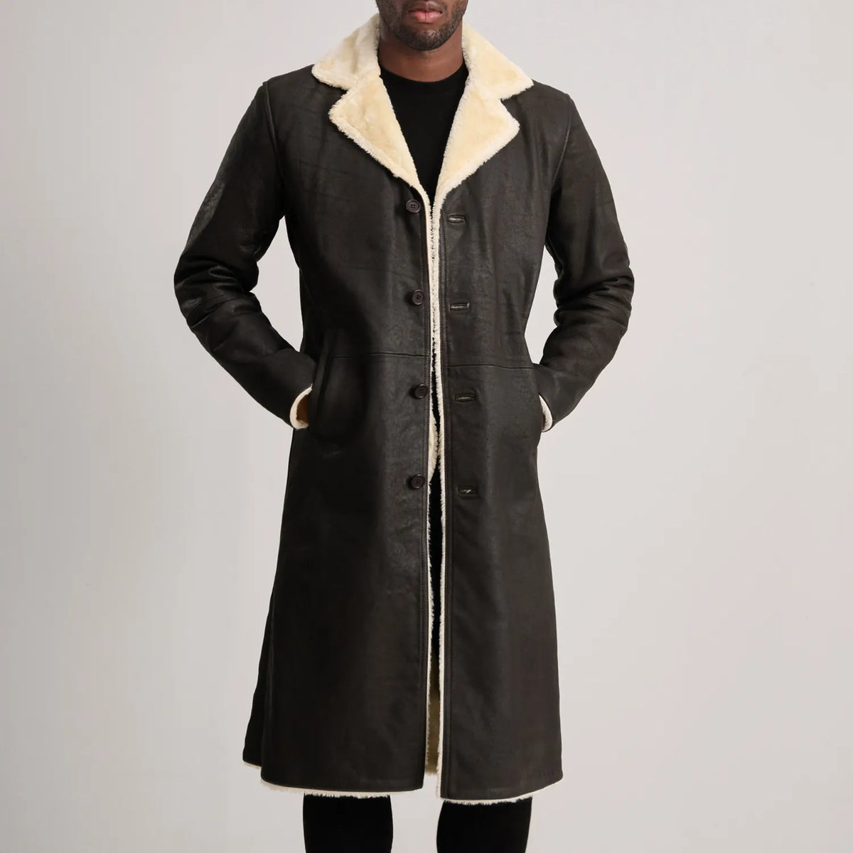 Close-Up Detail of Notch &amp; Button Hardware on Kolby Tumbled Brown Shearling Long Coat