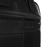 
100% Full-Grain Wax Pull-Up 100% Full-Grain Leather Grain Texture & Handcrafted Patina Detail