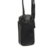 Styled Fit Perspective of Valdes Full-Grain Leather Phone Bag til Kvinder on Model - Natural Daylight Drape