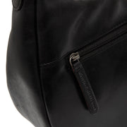 
100% Full-Grain Wax Pull-Up 100% Full-Grain Leather Grain Texture & Handcrafted Patina Detail