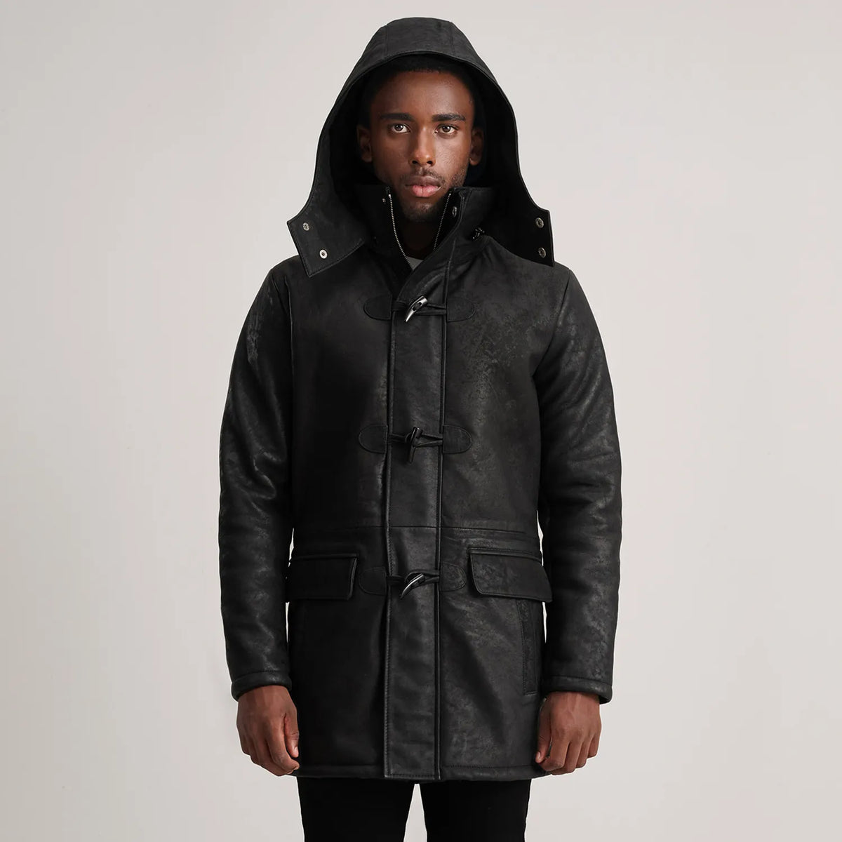 Close-Up Detail of Band collar &amp; Zipper with Toggle button Hardware on Nolan Black Snuffed Leather Duffle Coat